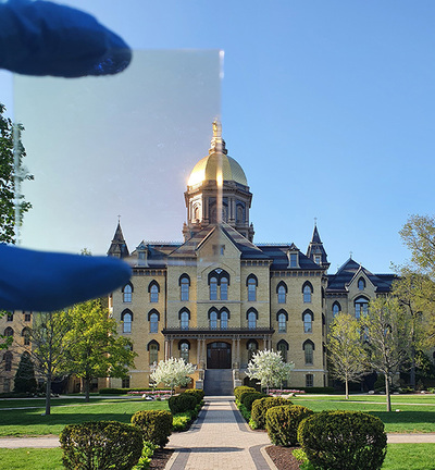 Transparent radiative coolers with the University of Notre Dame’s Main Building in the background