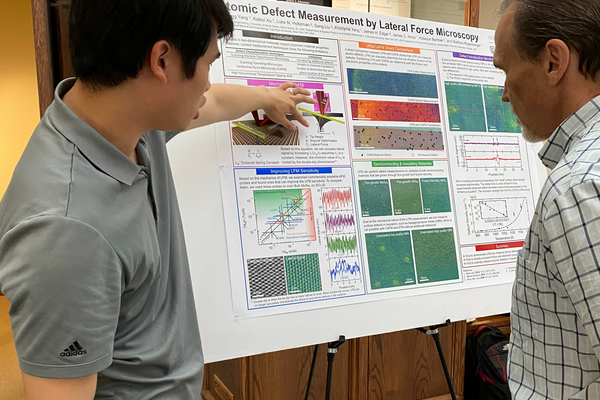 Yucheng Yang presents his poster titled, “Lateral force microscopy for atomic defect measurement”